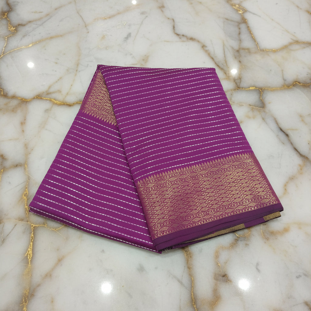 Kanchipuram Silk saree with Gold Zari Lined pattern with Gold Butta all over saree and pallu in Purple Color