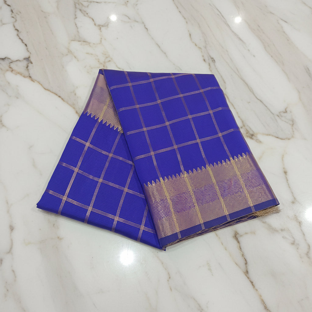 Kanchipuram Silk saree with Gold Zari big checkered pattern with Gold Butta all over saree and pallu in Royal Bluish Purple Color