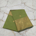 Kanchipuram Silk saree with Gold Zari checkered pattern with Gold Butta all over saree and pallu in Green color