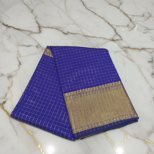 Blue Kanchipuram silk saree with mini zari checks and gold zari buttas