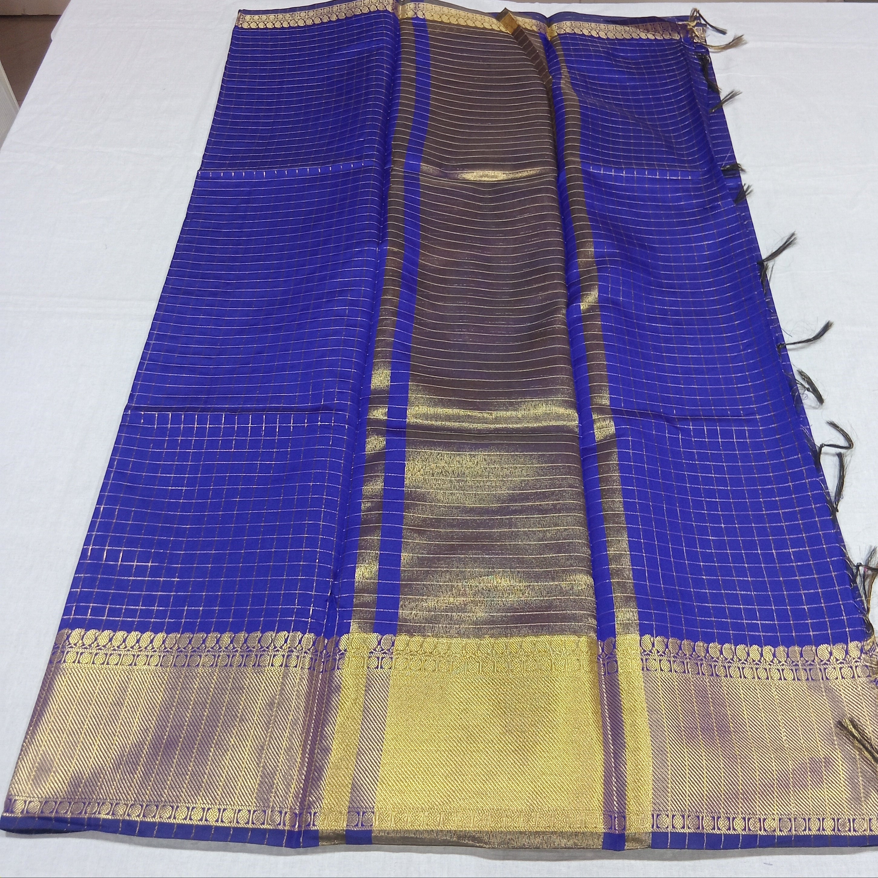 Kanchipuram Silk saree with Gold Zari mini checkered pattern with Gold Butta all over saree and pallu in Blue Color
