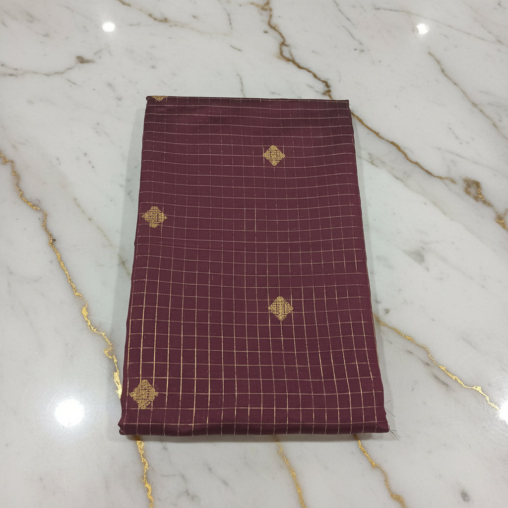 Kanchipuram Silk saree with Gold Zari checkered pattern with Gold Butta all over saree and pallu in Maroon color