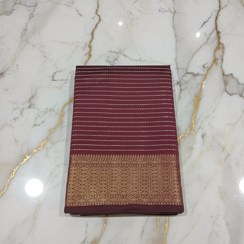 Kanchipuram Silk saree with Gold Zari Lined pattern with Gold Butta all over saree and pallu in