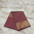 Kanchipuram Silk saree with Gold Zari Lined pattern with Gold Butta all over saree and pallu in