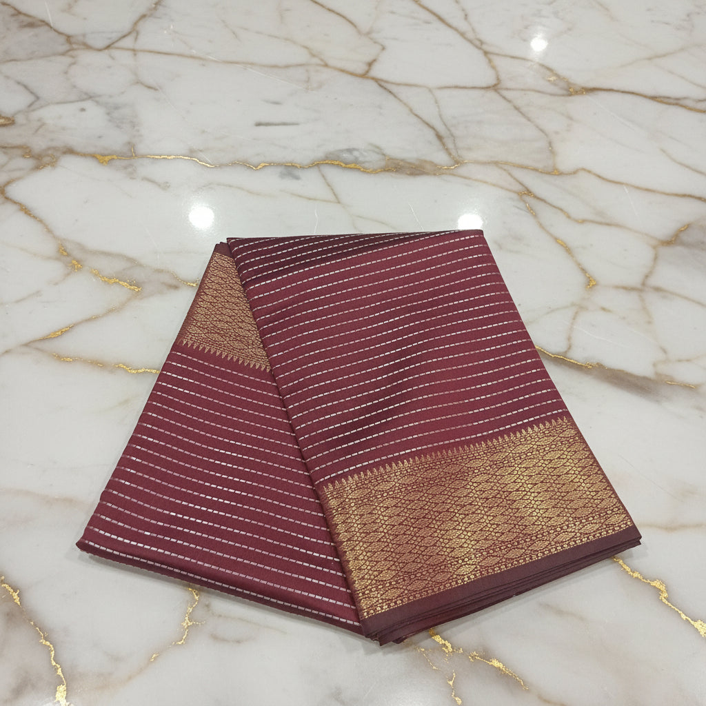 Kanchipuram Silk saree with Gold Zari Lined pattern with Gold Butta all over saree and pallu in