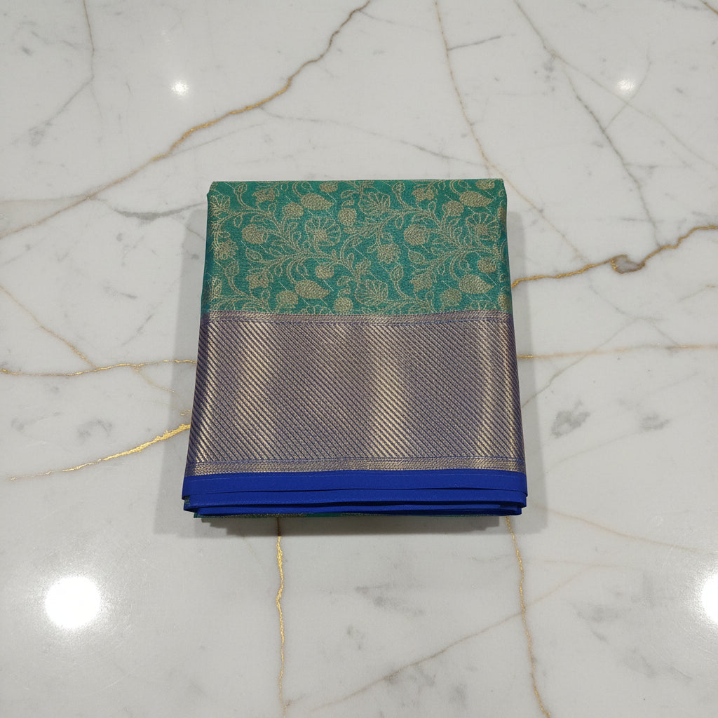 Kanchipuram Silk saree with Gold Zari pattern with Gold Butta all over saree and pallu in Aqua Green Blue Color
