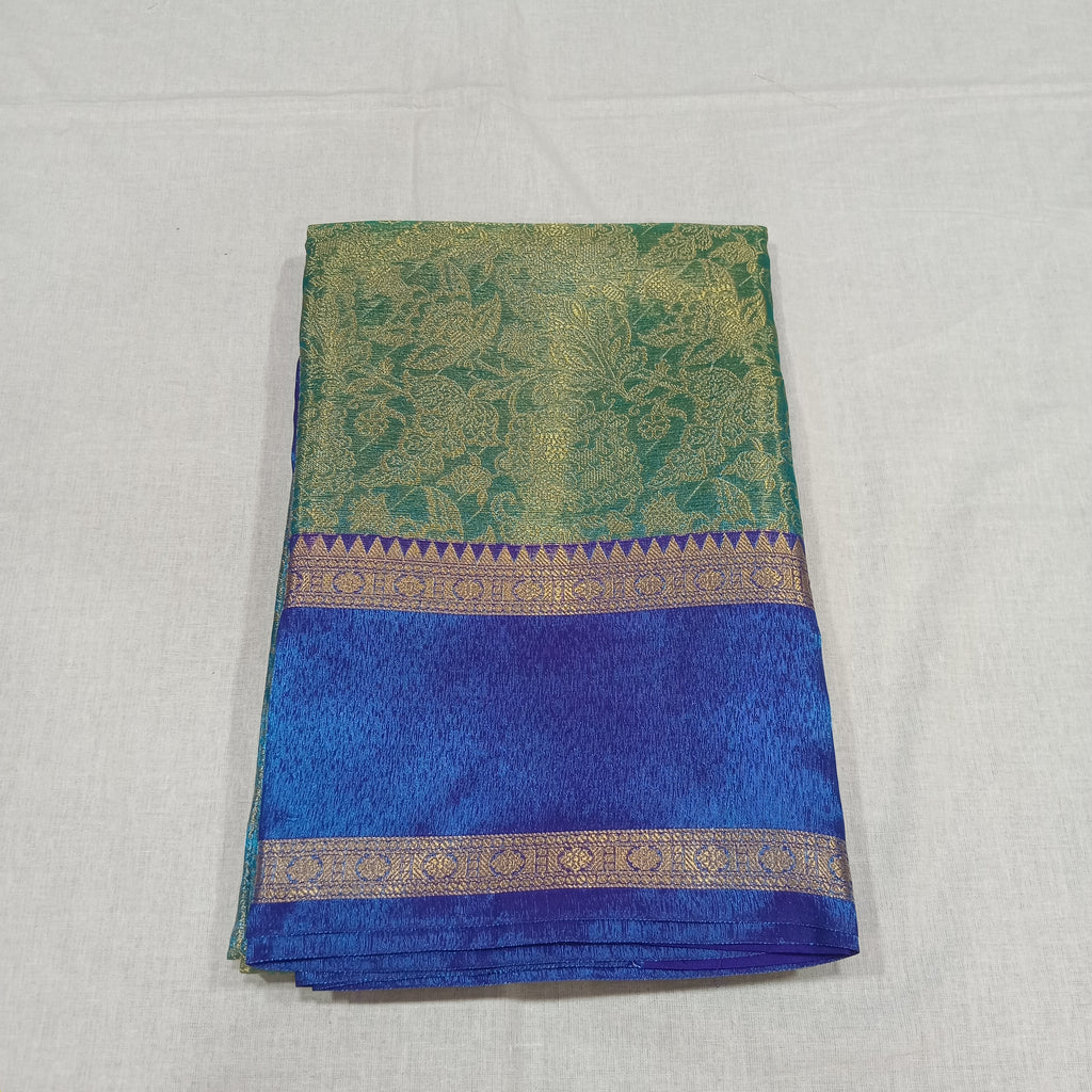 Kanchipuram Silk saree with Gold Zari pattern with Gold Butta all over saree and pallu in Greenish Blue Color