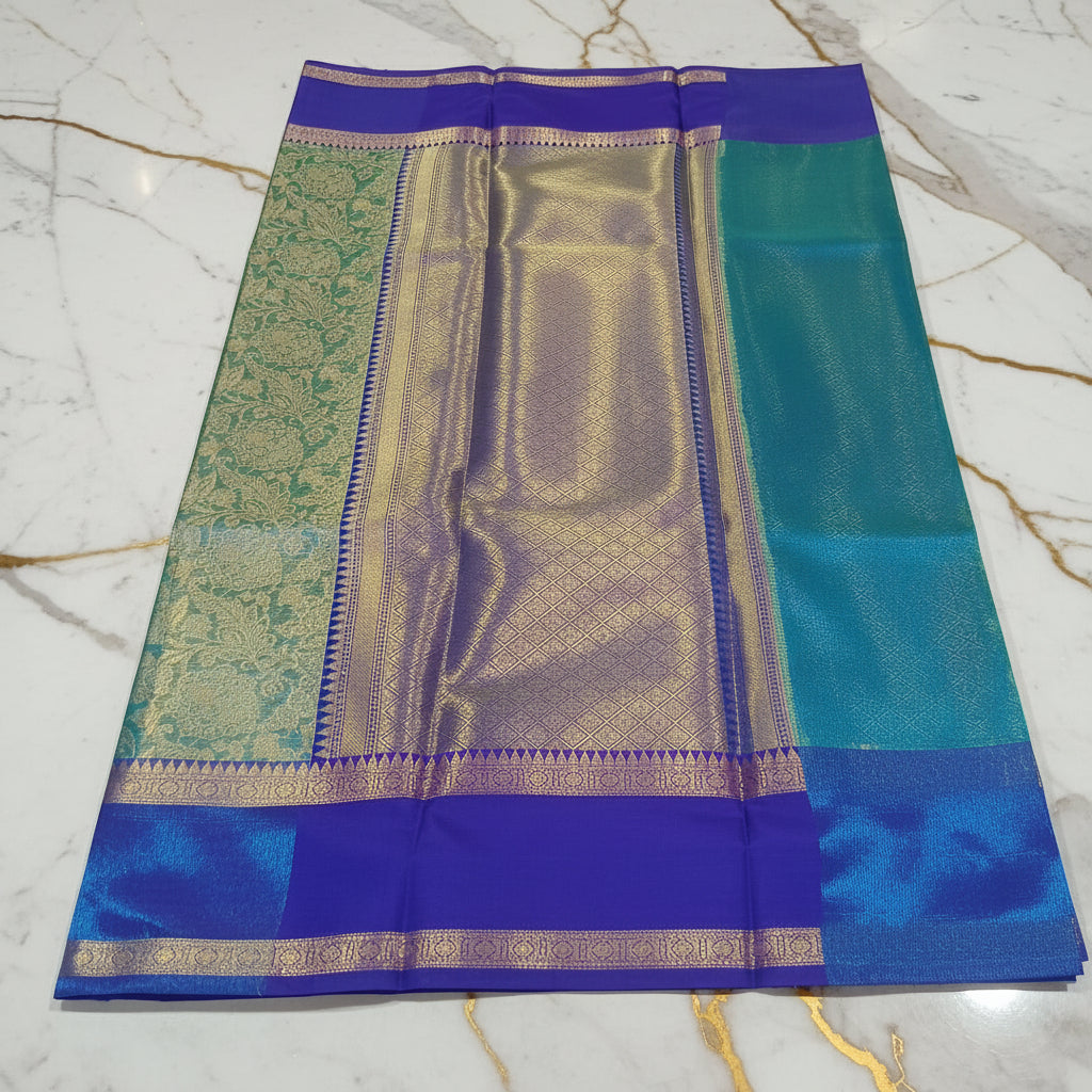 Kanchipuram Silk saree with Gold Zari pattern with Gold Butta all over saree and pallu in Greenish Blue Color