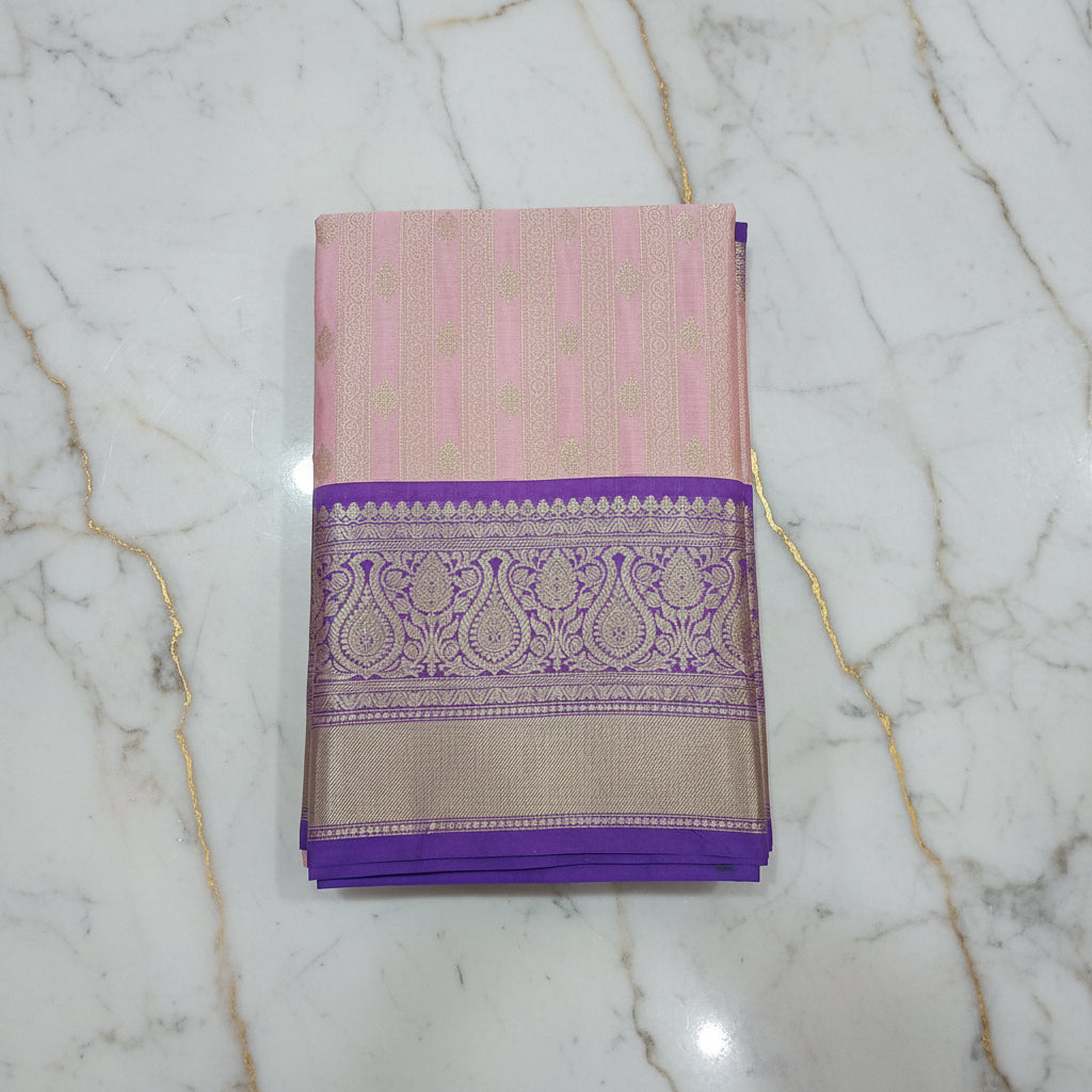 Kanchipuram Silk saree with Gold Zari pattern with Gold Butta all over saree and pallu in Pink Purple Color