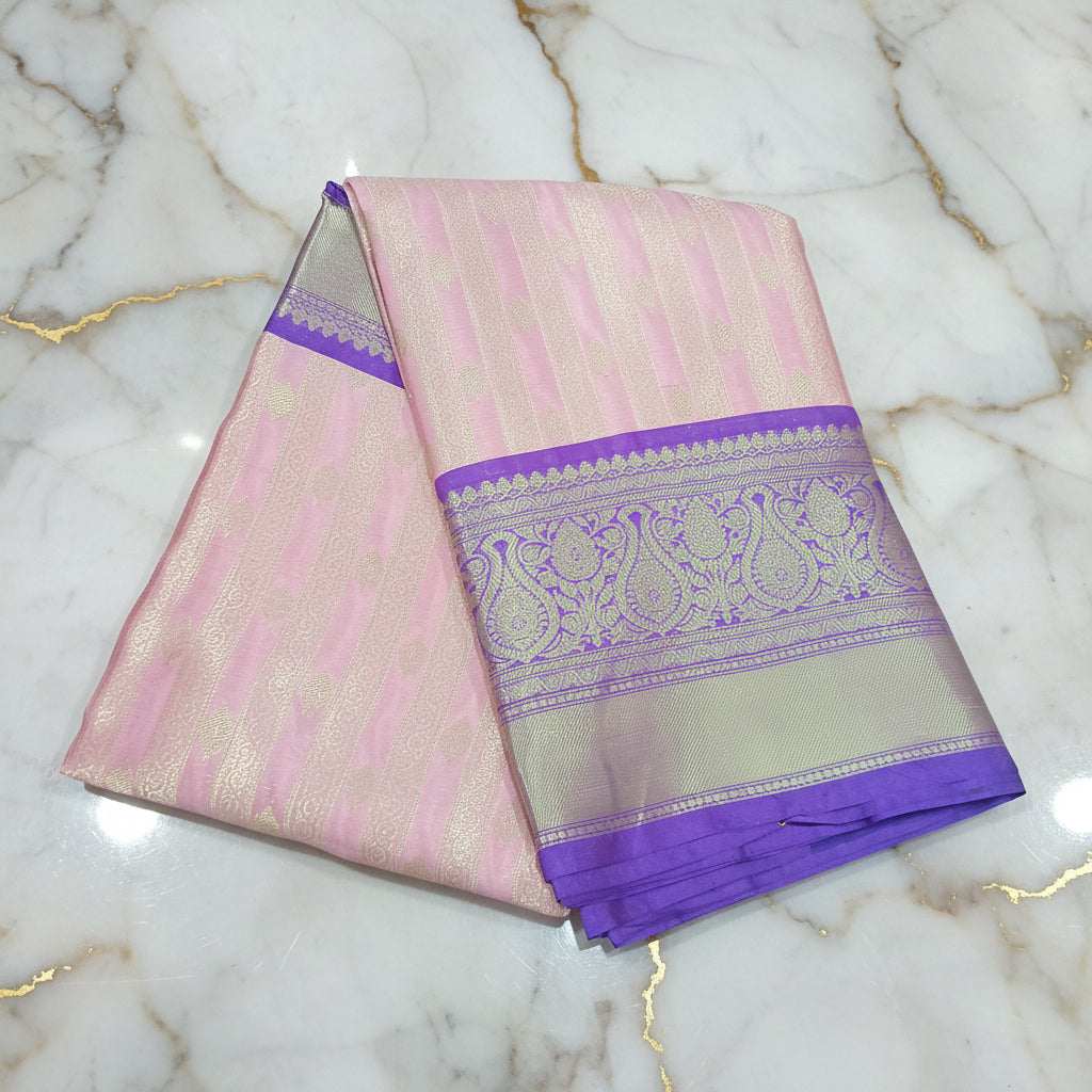 Kanchipuram Silk saree with Gold Zari pattern with Gold Butta all over saree and pallu in Pink Purple Color