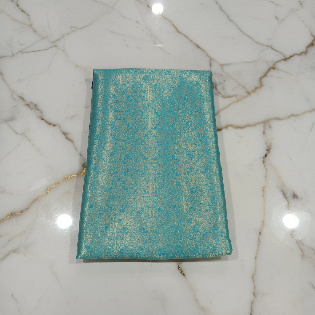 Kanchipuram Silk saree with Gold Zari pattern with Gold Butta all over saree and pallu in Bluish Blue Color