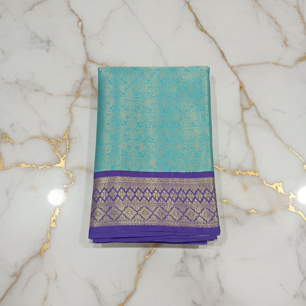 Kanchipuram Silk saree with Gold Zari pattern with Gold Butta all over saree and pallu in Bluish Blue Color