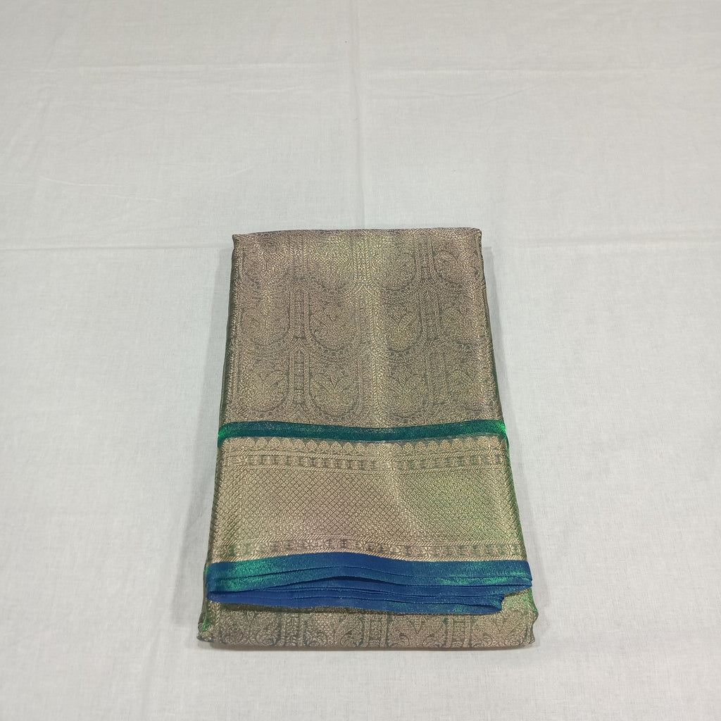 Kanchipuram Silk saree with Gold Zari pattern with Gold Butta all over saree and pallu in Greenish Green Color