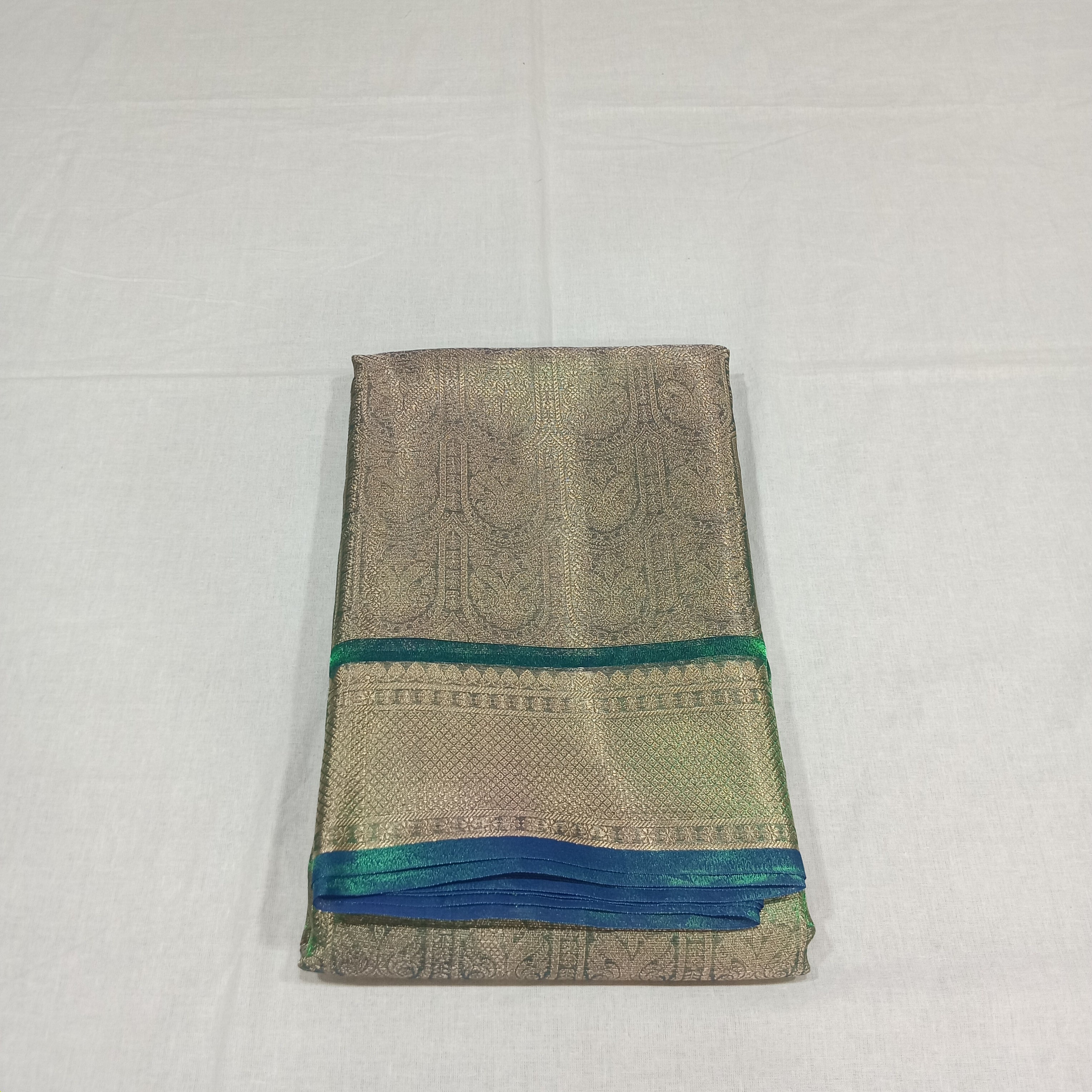 Kanchipuram Silk saree with Gold Zari pattern with Gold Butta all over saree and pallu in Greenish Green Color
