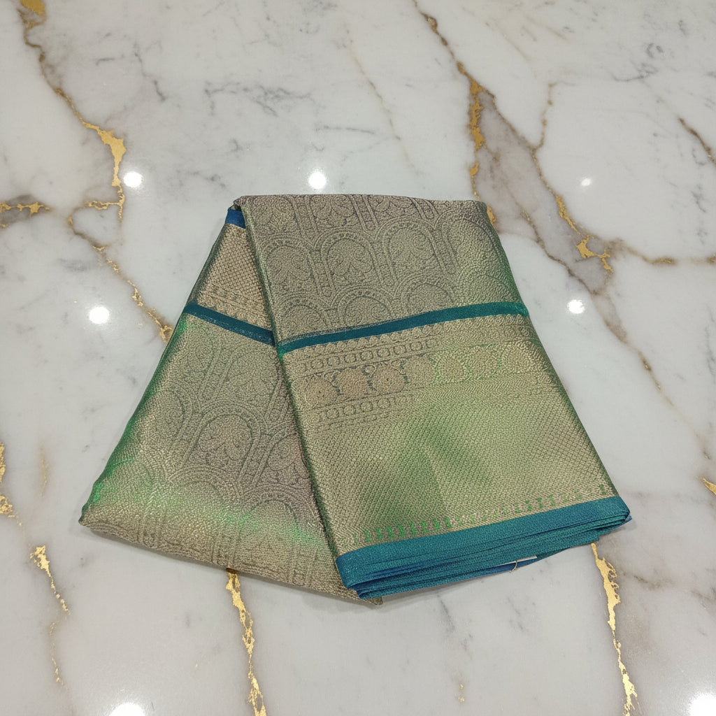 Kanchipuram Silk saree with Gold Zari pattern with Gold Butta all over saree and pallu in Greenish Green Color