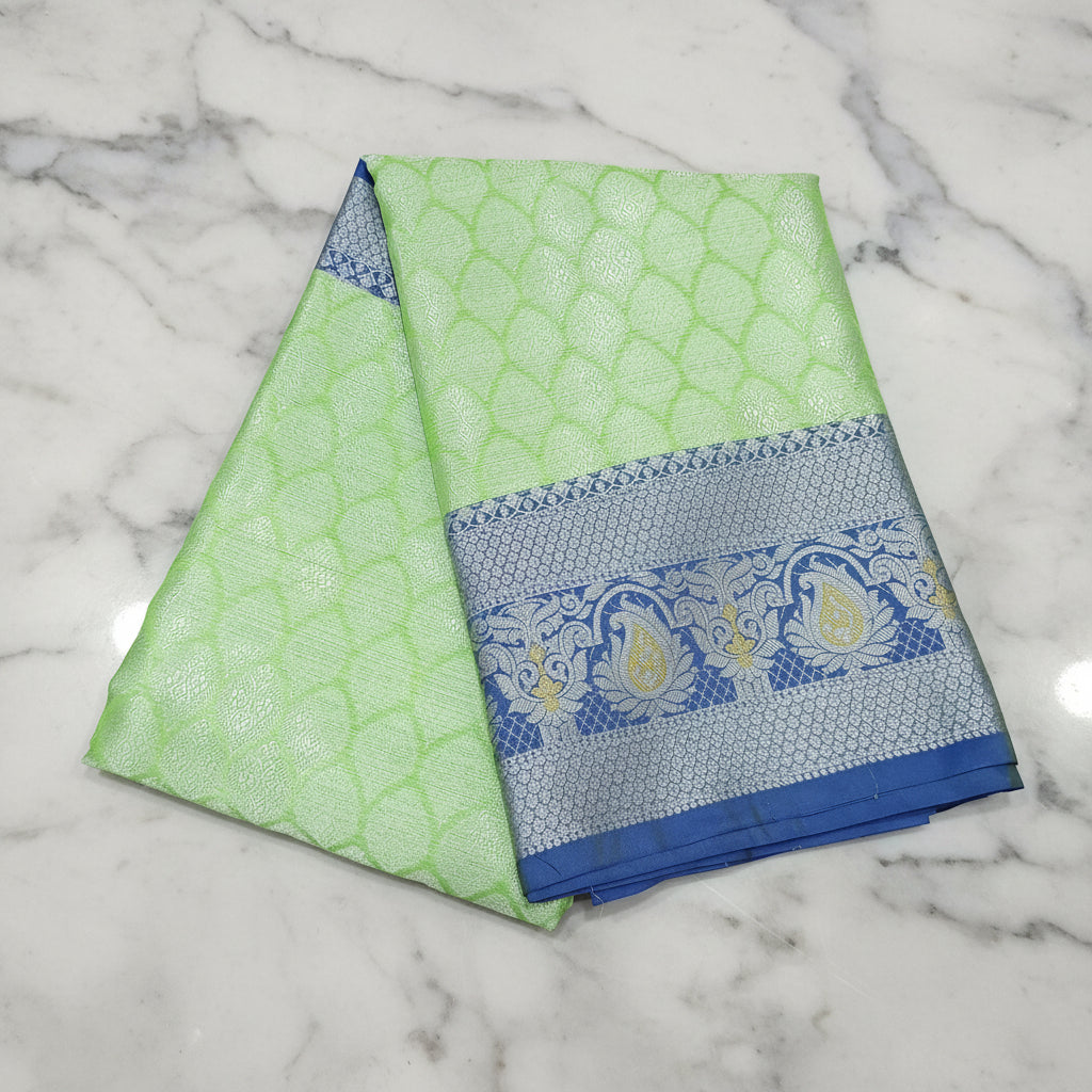 Semi Kanchipuram Silk Saree with Gold Zari Buttas and Contrast Border in Greenish Blue Color