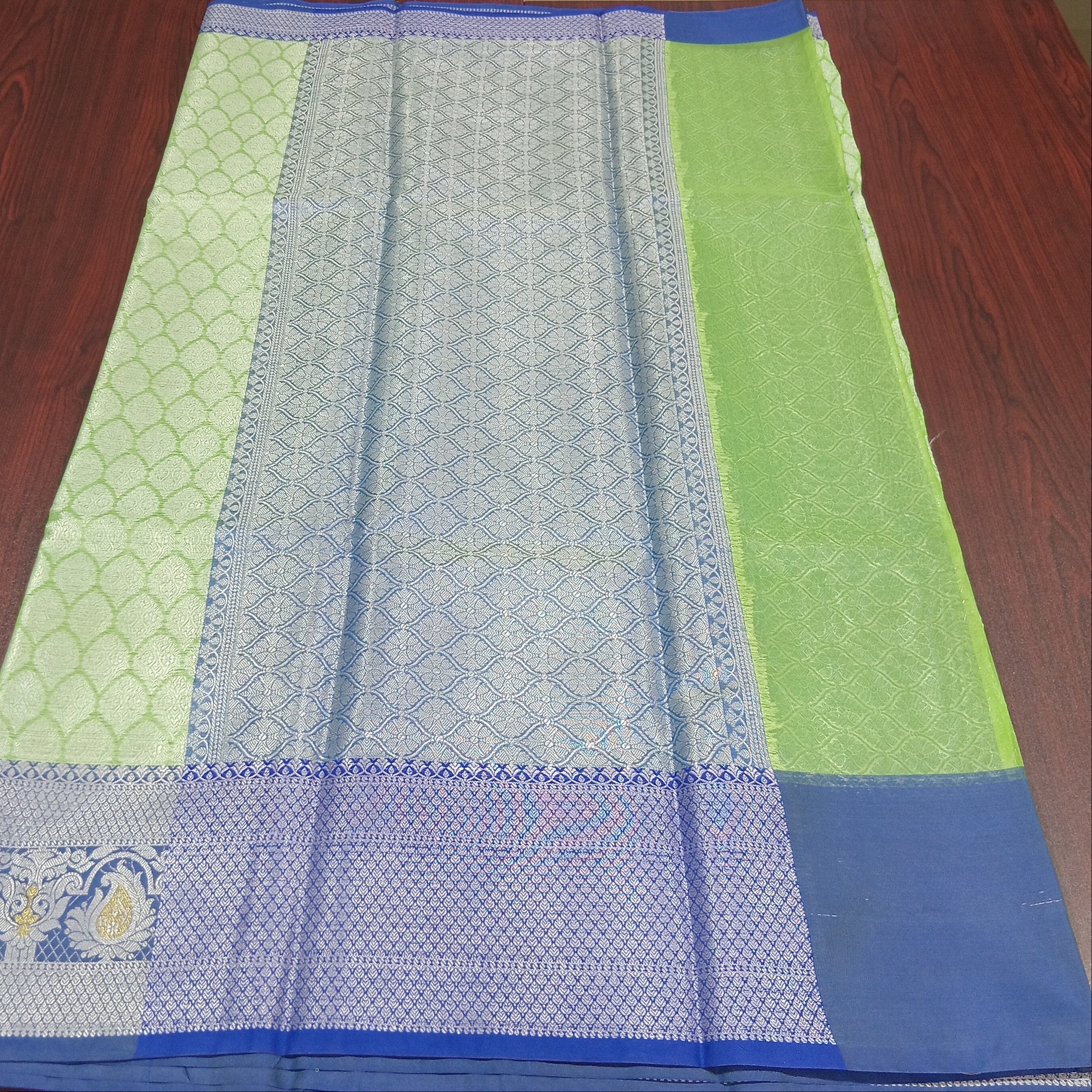 Semi Kanchipuram Silk Saree with Gold Zari Buttas and Contrast Border in Greenish Blue Color