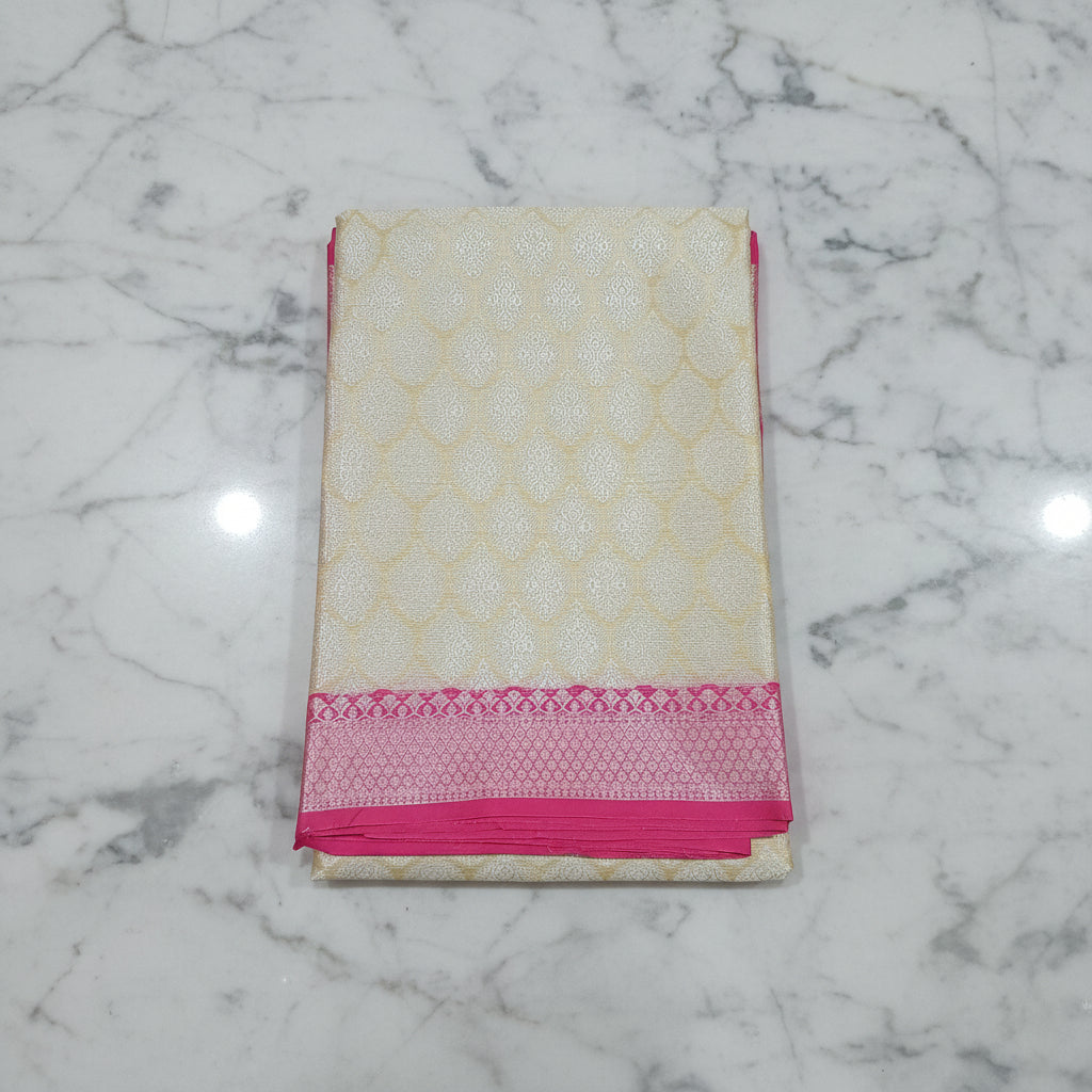 Semi Kanchipuram Silk Saree with Gold Zari Buttas and Contrast Border in Yellowish Cream Pink Color