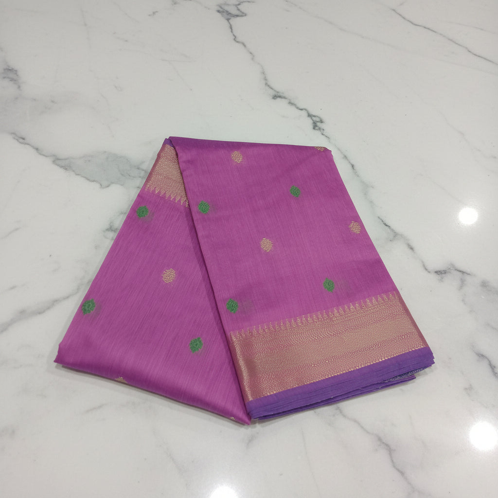 Chandheri Silk Saree with Flower Polka Dots Buttas with Gold Zari Border and Tassels in Lotus Pink color