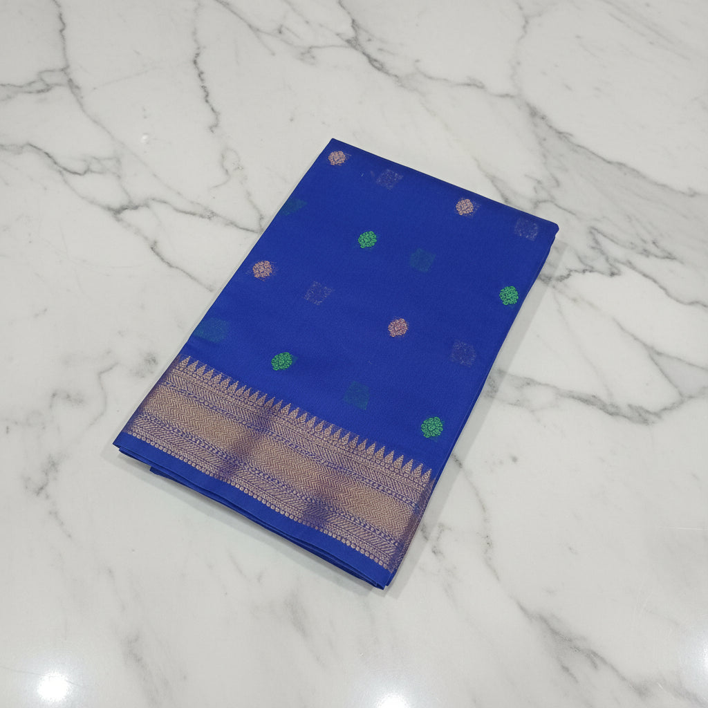Chandheri Silk Saree with Flower Polka Dots Buttas with Gold Zari Border and Tassels in Royal Blue color