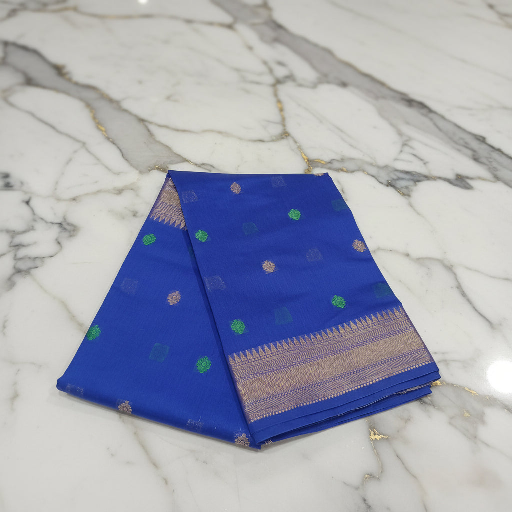 Chandheri Silk Saree with Flower Polka Dots Buttas with Gold Zari Border and Tassels in Royal Blue color