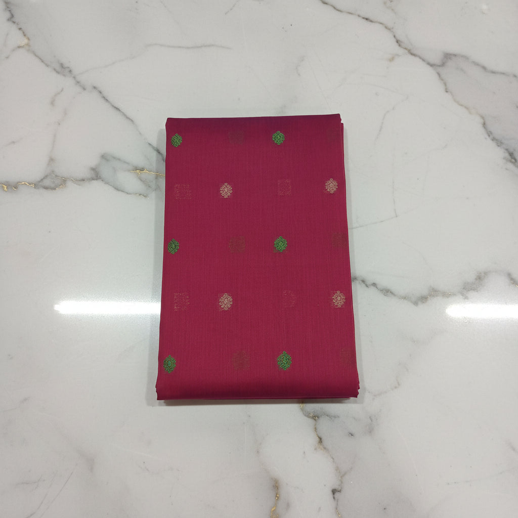 Chandheri Silk Saree with Flower Polka Dots Buttas with Gold Zari Border and Tassels in Reddish Red color with gold green buttas