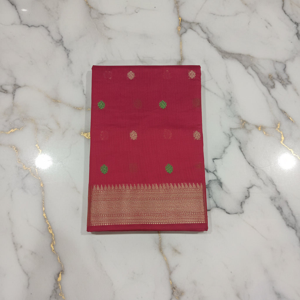 Chandheri Silk Saree with Flower Polka Dots Buttas with Gold Zari Border and Tassels in Reddish Red color with gold green buttas
