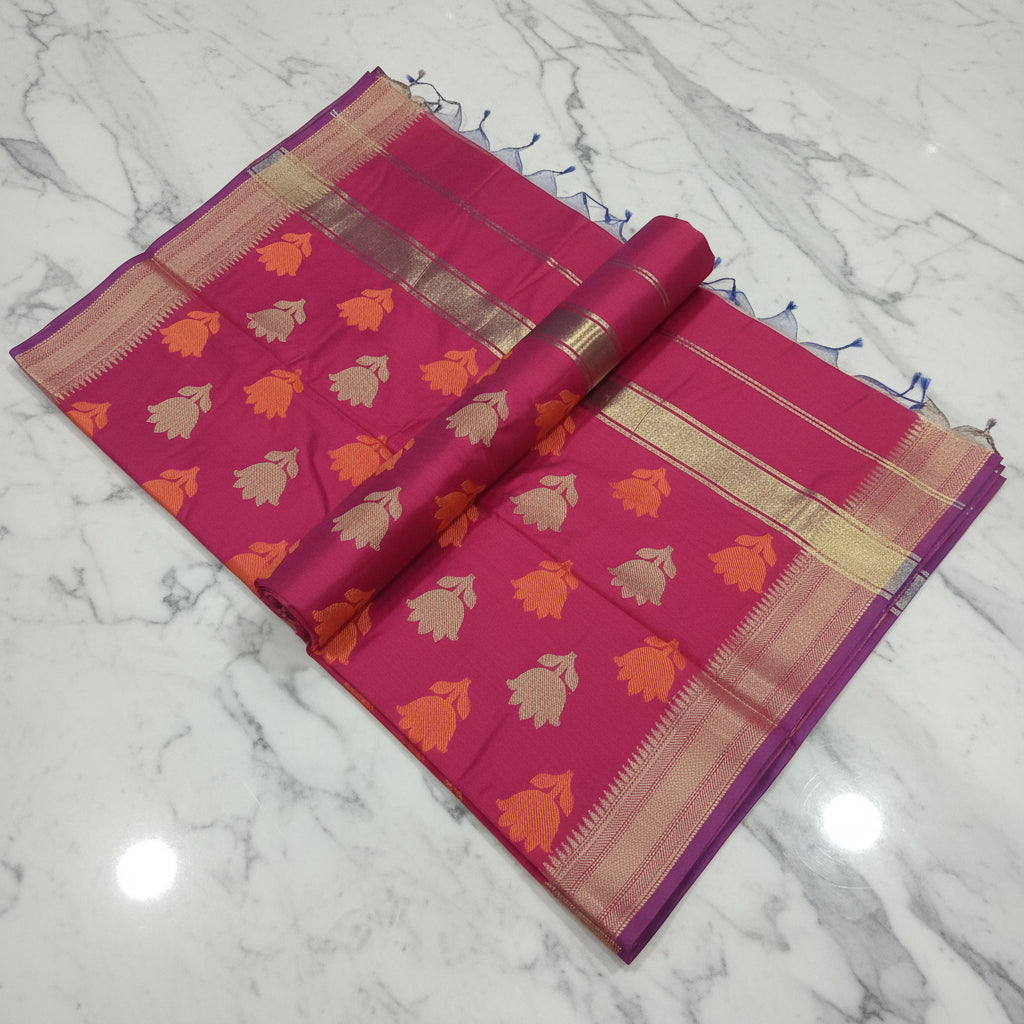 Chandheri Silk Saree with Flower Polka Dots Buttas with Gold Zari Border and Tassels in Reddish Red color with gold green buttas