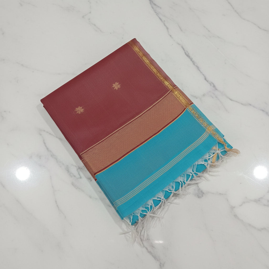 Chandheri Silk Saree with beautiful Butta Motifs in Turquoise Blue and Coffee Brown Contrast with Tassels