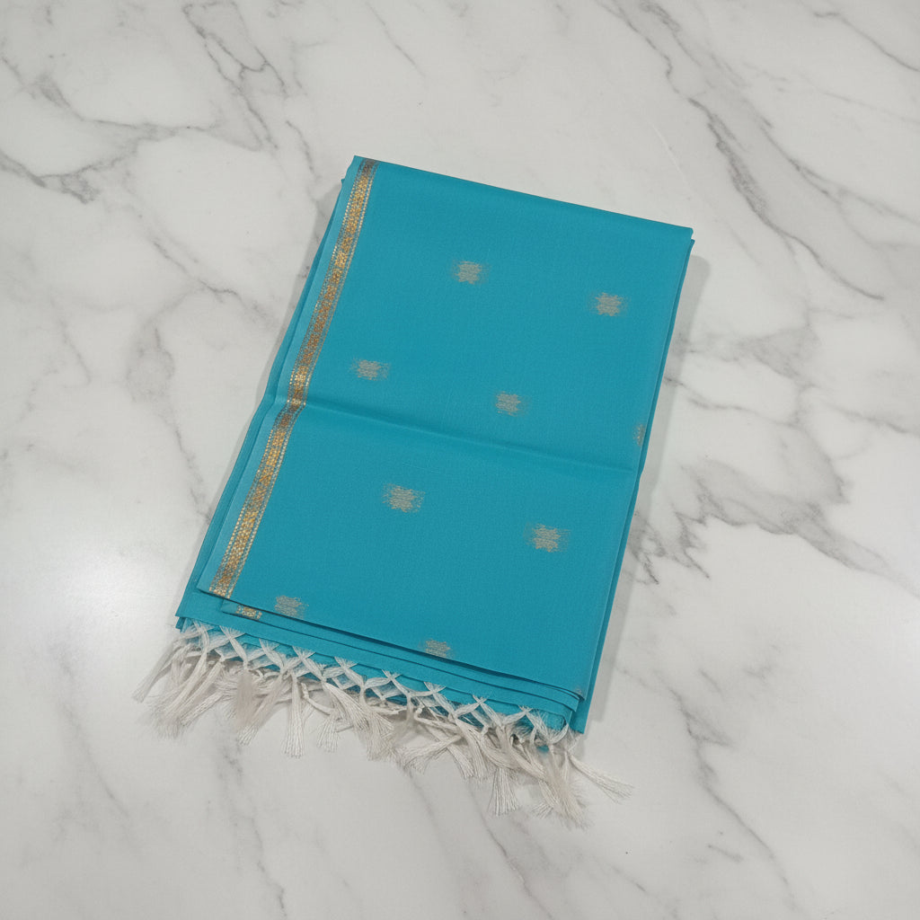 Chandheri Silk Saree with beautiful Butta Motifs in Turquoise Blue and Coffee Brown Contrast with Tassels