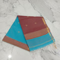 Chandheri Silk Saree with beautiful Butta Motifs in Turquoise Blue and Coffee Brown Contrast with Tassels