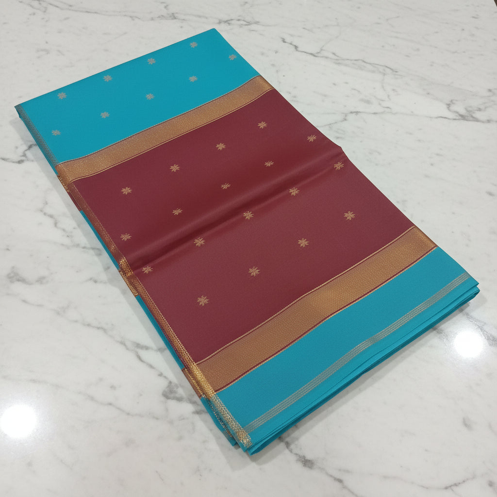 Chandheri Silk Saree with beautiful Butta Motifs in Turquoise Blue and Coffee Brown Contrast with Tassels