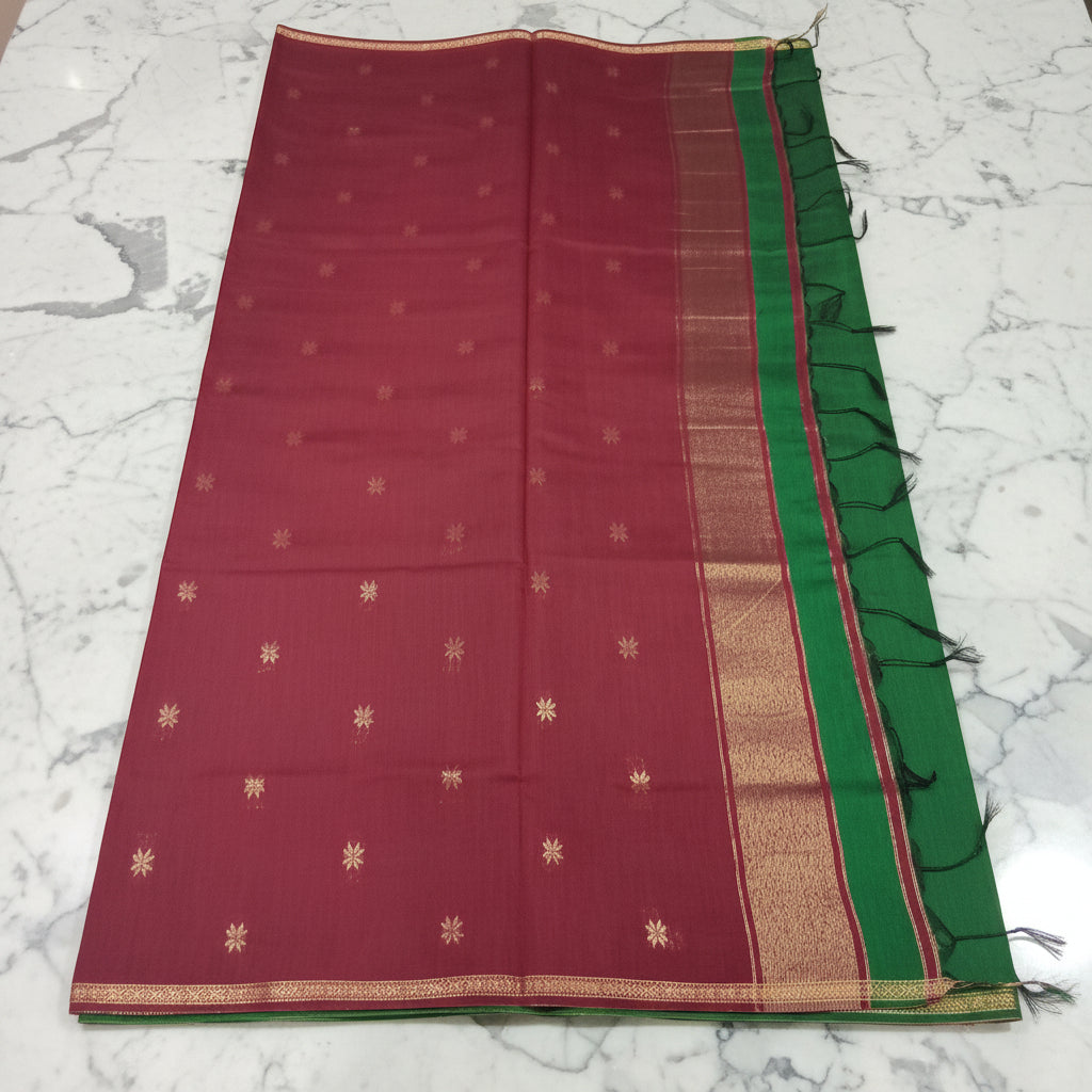 Chandheri Silk Saree with beautiful Butta Motifs in Leaf Green and Maroon Contrast with Tassels
