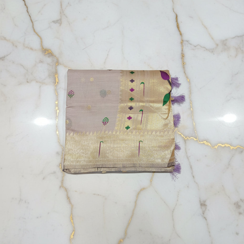 Patola Pure Silk Saree with Rich Gold Color Zari Border and Pallu in Light Purple Color