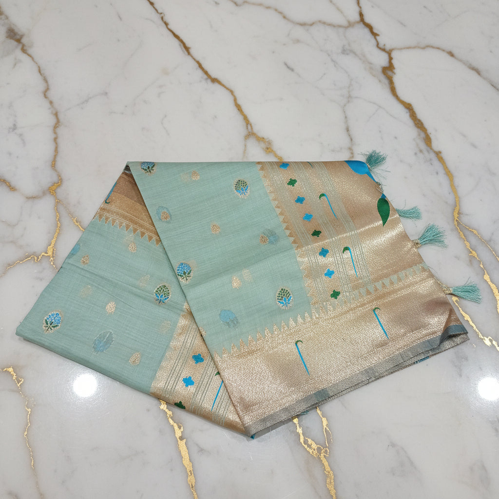 Patola Pure Silk Saree with Rich Gold Color Zari Border and Pallu in Light Blue Color
