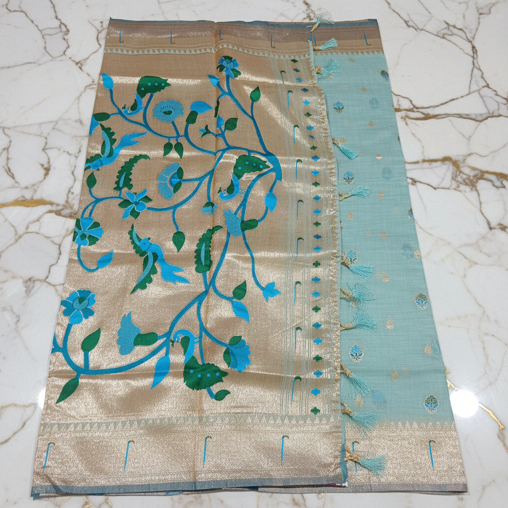 Patola Pure Silk Saree with Rich Gold Color Zari Border and Pallu in Light Blue Color