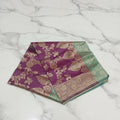 Banarasi Pure Silk Saree with luxurious Gold Zari Floral Buttas all over the saree and Pallu with leaf pattern in Purple Green Color