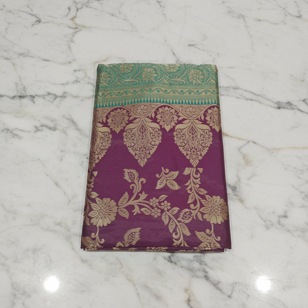 Banarasi Pure Silk Saree with luxurious Gold Zari Floral Buttas all over the saree and Pallu with leaf pattern in Purple Green Color