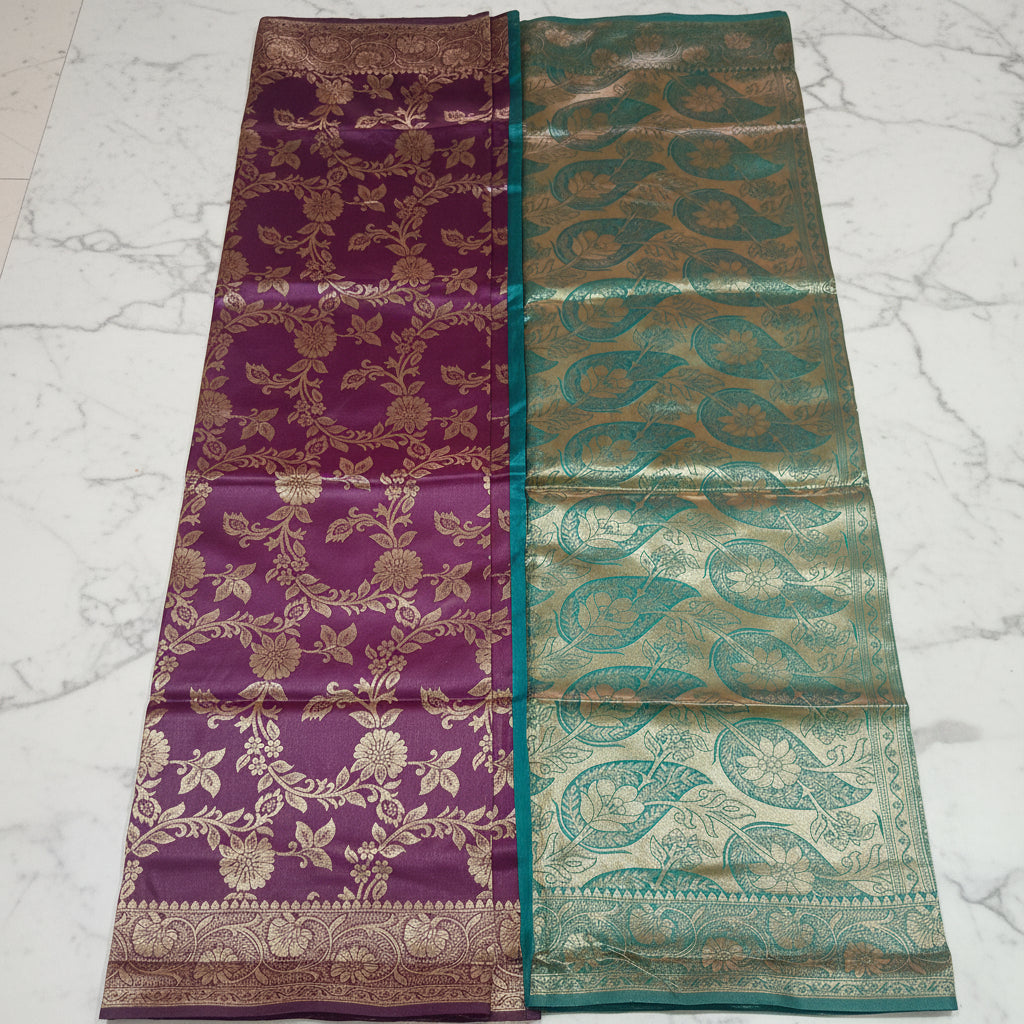 Banarasi Pure Silk Saree with luxurious Gold Zari Floral Buttas all over the saree and Pallu with leaf pattern in Purple Green Color