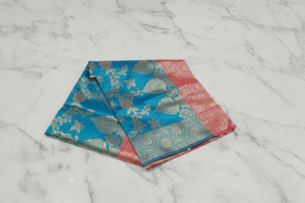 Banarasi Pure Silk Saree with luxurious Gold Zari Floral Buttas all over the saree and Pallu with leaf pattern in Aqua Blue Green Color