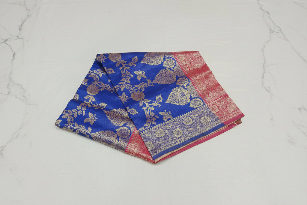 Banarasi Pure Silk Saree with luxurious Gold Zari Floral Buttas all over the saree and Pallu with leaf pattern in Royal Blue Red Color