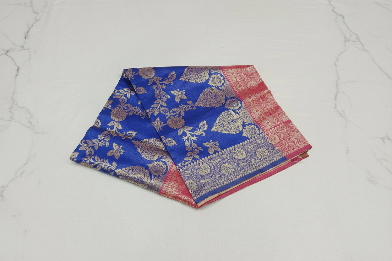 Banarasi Pure Silk Saree with luxurious Gold Zari Floral Buttas all over the saree and Pallu with leaf pattern in Royal Blue Red Color