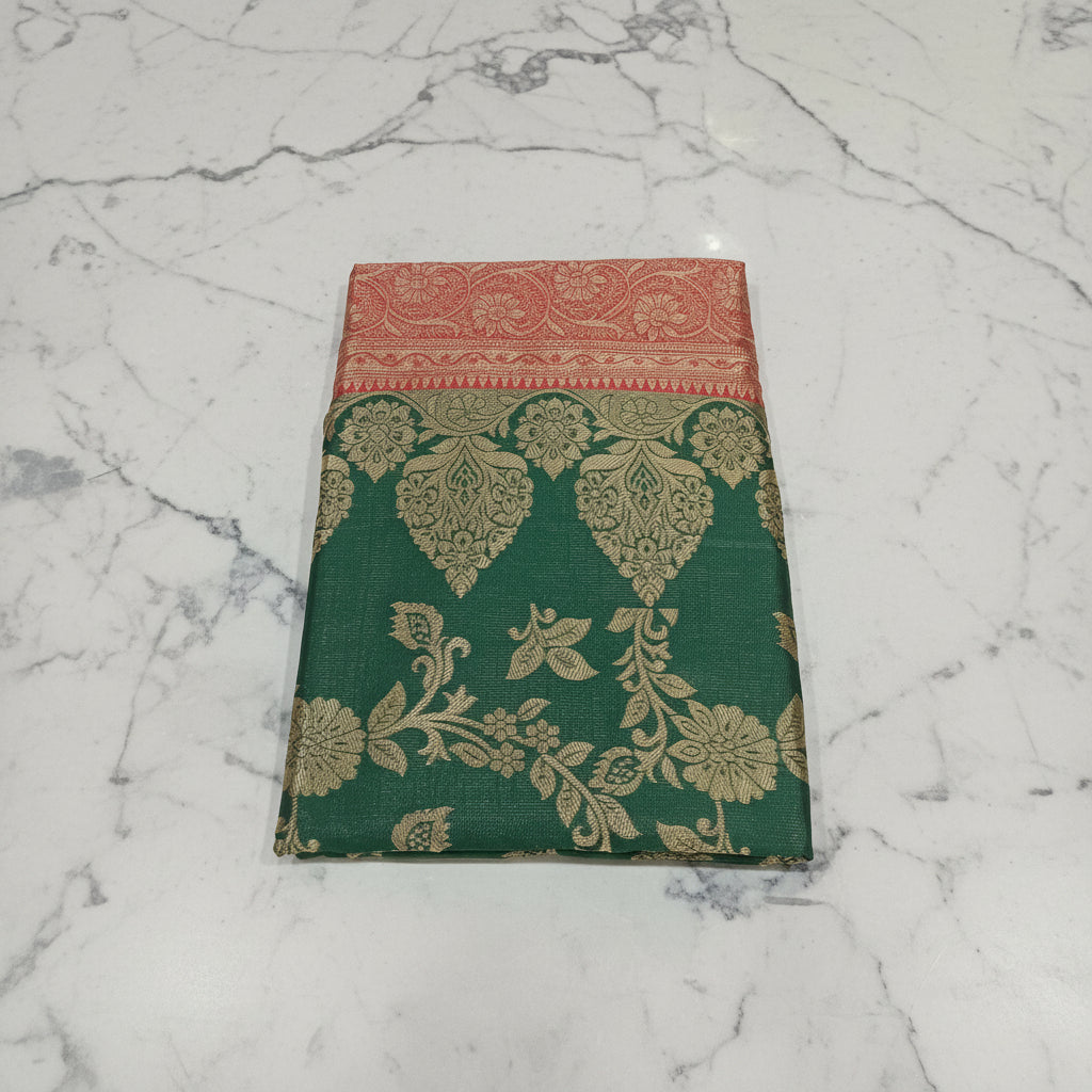 Banarasi Pure Silk Saree with luxurious Gold Zari Floral Buttas all over the saree and Pallu with leaf pattern in Leaf Green Red Color