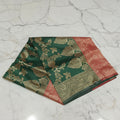 Banarasi Pure Silk Saree with luxurious Gold Zari Floral Buttas all over the saree and Pallu with leaf pattern in Leaf Green Red Color