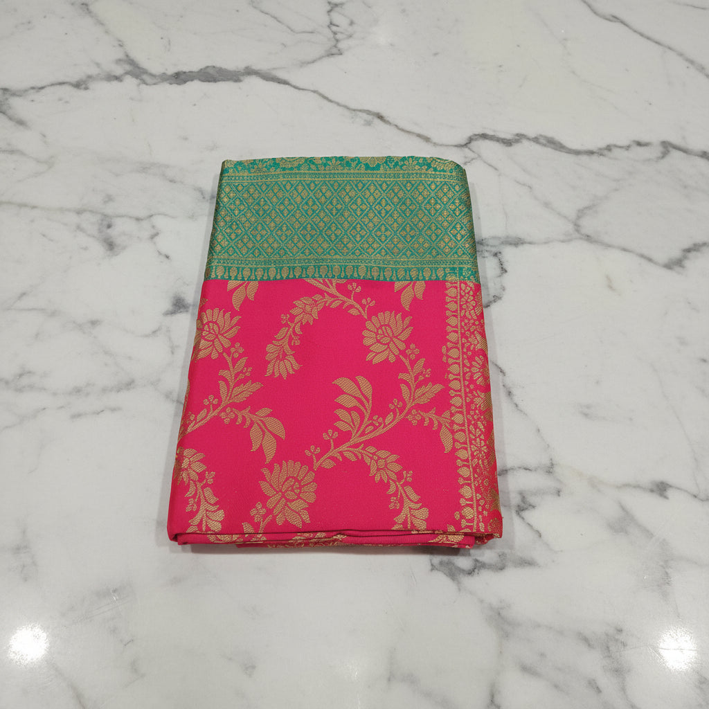 Banarasi Pure Silk Saree with luxurious Gold Zari Floral Buttas all over the saree and Pallu in Royal Pink and Green Color