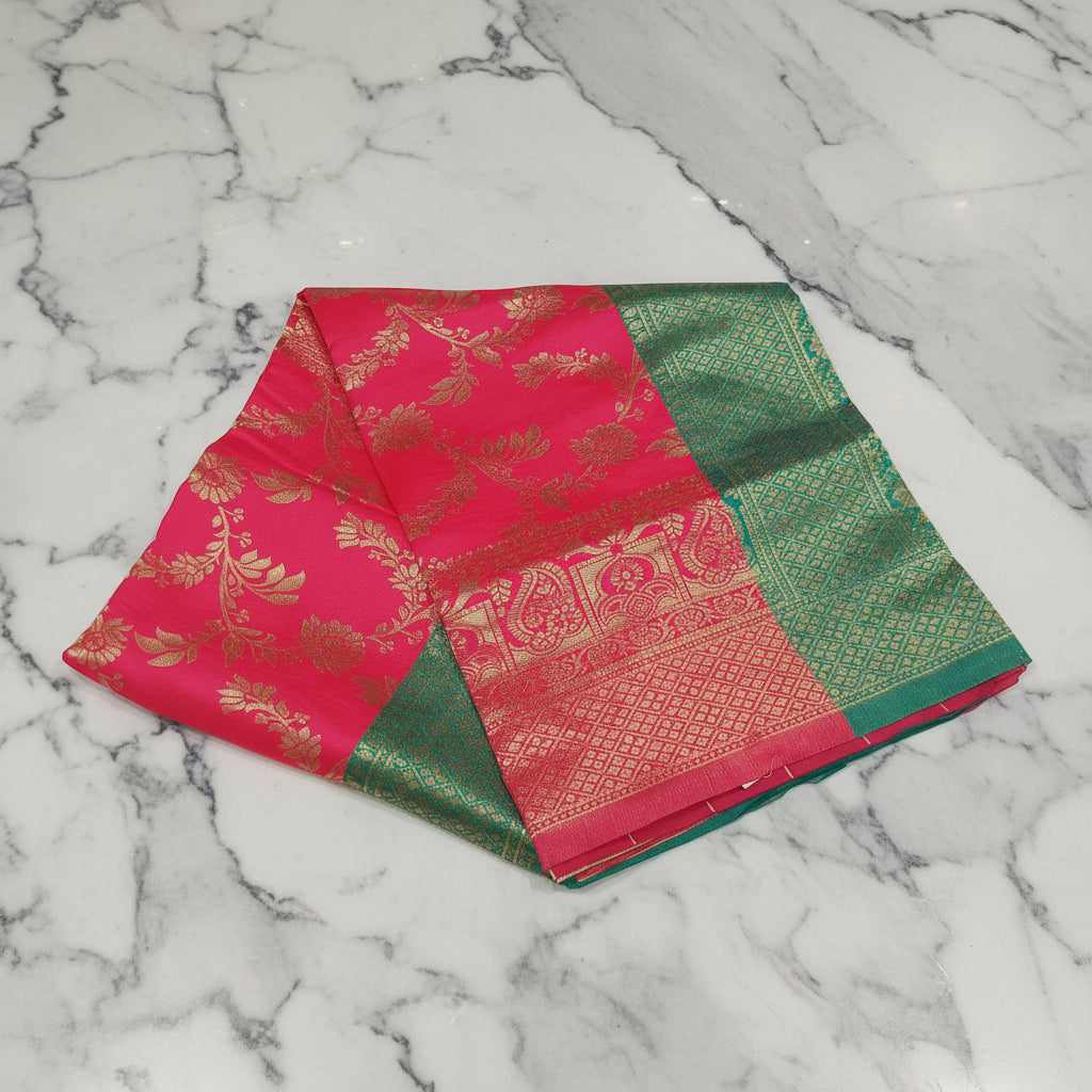 Banarasi Pure Silk Saree with luxurious Gold Zari Floral Buttas all over the saree and Pallu in Royal Pink and Green Color