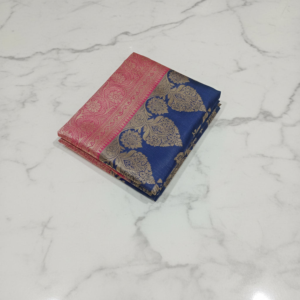 Banarasi Pure Silk Saree with luxurious Gold Zari Floral Buttas all over the saree and Pallu with leaf pattern in Navy Blue Red Color