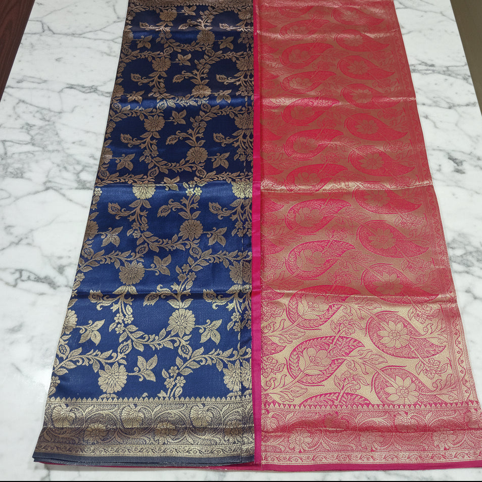 Banarasi Pure Silk Saree with luxurious Gold Zari Floral Buttas all over the saree and Pallu with leaf pattern in Navy Blue Red Color