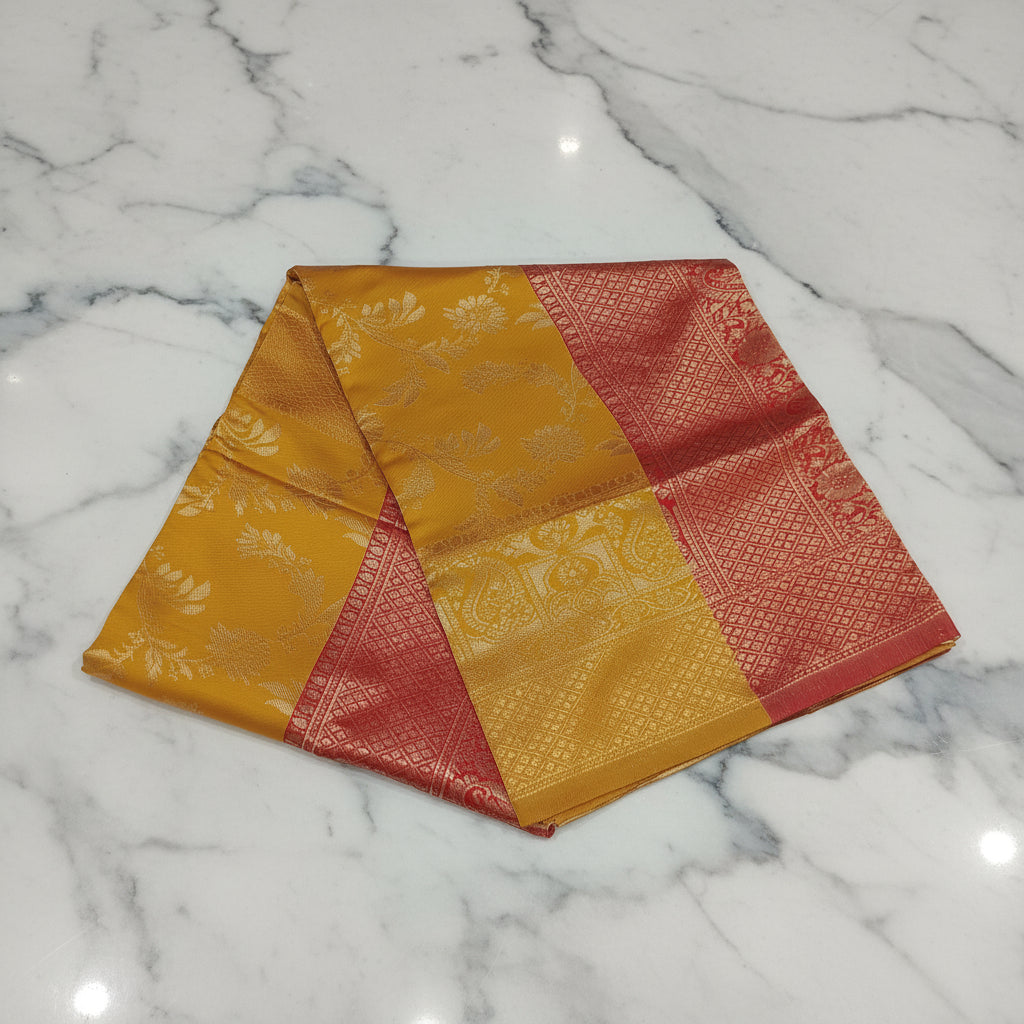 Banarasi Pure Silk Saree with luxurious Gold Zari Floral Buttas all over the saree and Pallu in Yellow and Dark Red Color