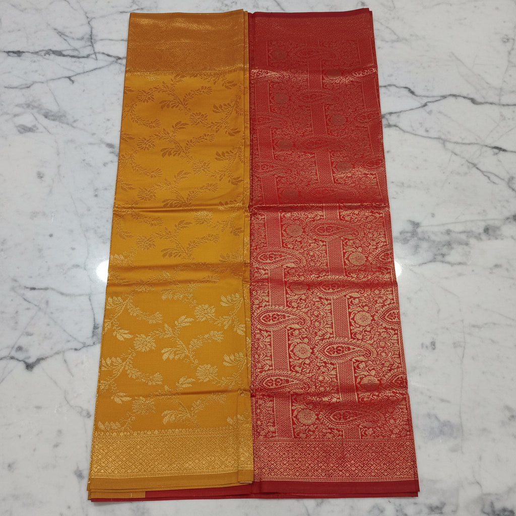 Banarasi Pure Silk Saree with luxurious Gold Zari Floral Buttas all over the saree and Pallu in Yellow and Dark Red Color